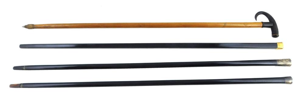 Appraisal: Four late th early th C walking sticks a Switzerland