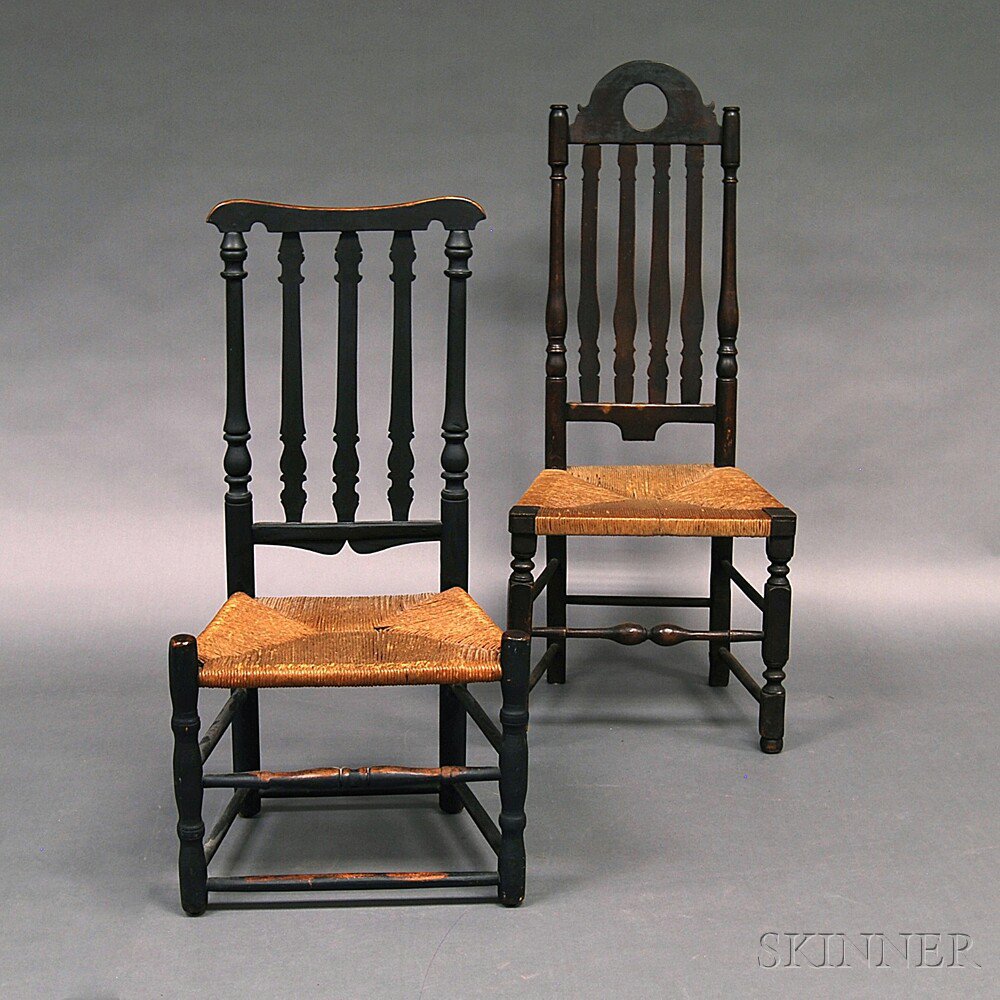 Appraisal: Two Black-painted Bannister-back Side Chairs restoration ht to in Estimate