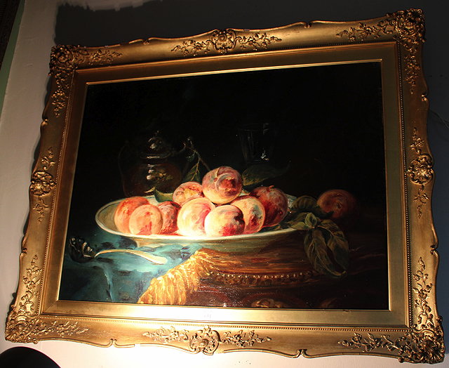 Appraisal: A STILL LIFE oil on canvas in a gilded gesso