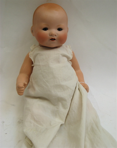 Appraisal: BISQUE HEAD INFANT DOLL COMPOSITION GIRL DOLL pieces the German