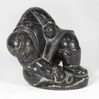 Appraisal: Timothy Kuanapik Kuana Puvirnituq - Inuit soapstone figural scultpure depicting