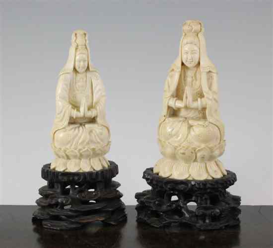 Appraisal: Two graduated Chinese ivory seated figures of Guanyin early th