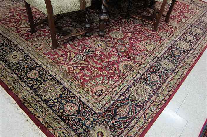 Appraisal: HAND KNOTTED ORIENTAL CARPET Indo-Persian overall floral design on red