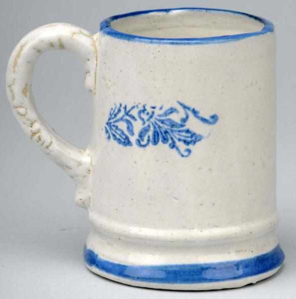 Appraisal: Blue Stenciled Stoneware Mug Description No damage Condition Mint Size