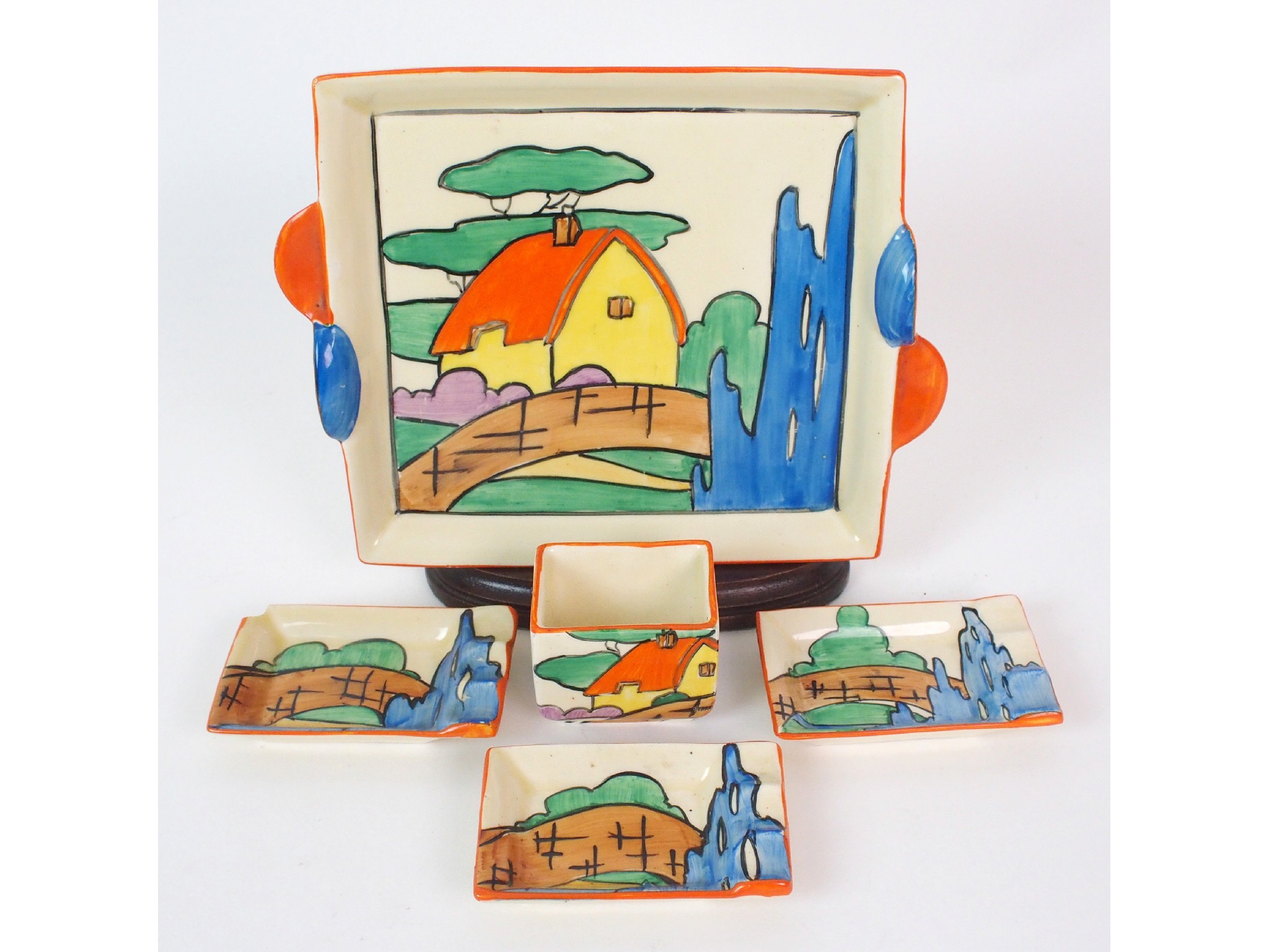 Appraisal: A Clarice Cliff Bizarre Orange Roof Cottage pattern smoker's setcirca