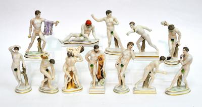 Appraisal: A SET OF TWELVE NAPLES PORCELAIN FIGURES modelled as nude