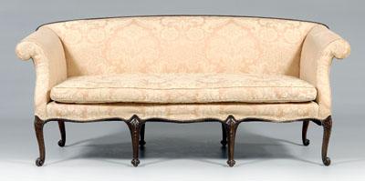 Appraisal: Chippendale style upholstered sofa mahogany with gadrooned crest rolled arms