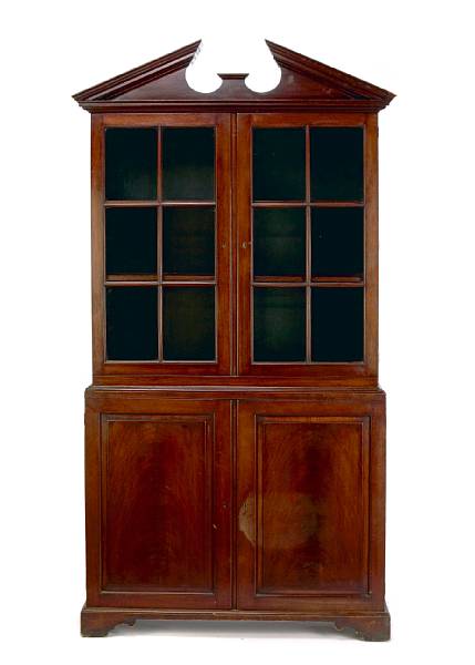 Appraisal: A George III style mahogany bookcase height ft in width