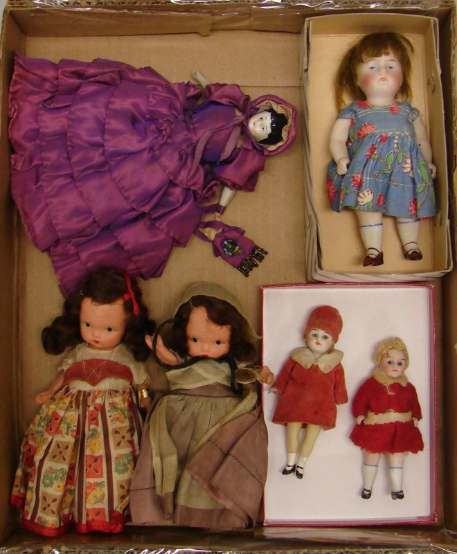 Appraisal: Lot of dolls German S doll with painted eyes -strap