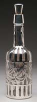 Appraisal: STERLING SILVER OVERLAY DECANTER In bottle form having a trailing