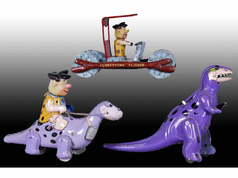 Appraisal: Lot of Tin Hanna-Barbera Flintstone Toys Description All '' L