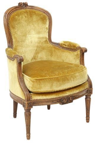 Appraisal: French Louis XVI style armchair th c walnut frame velvet