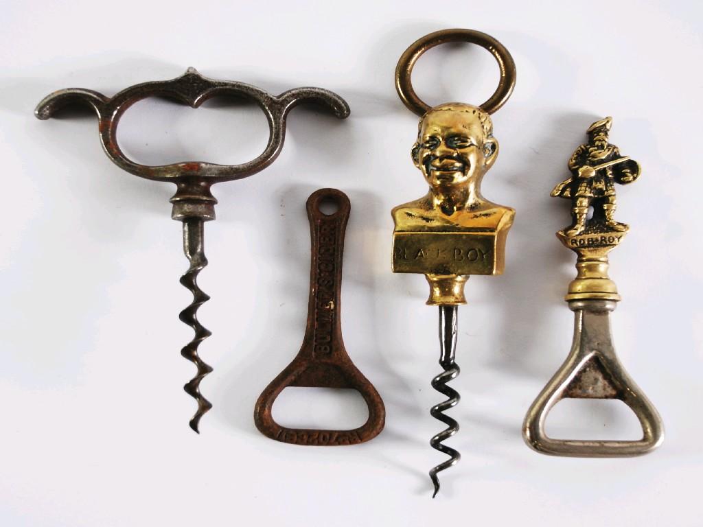 Appraisal: BRASS AND STEEL CORKSCREW the handle formed of a head