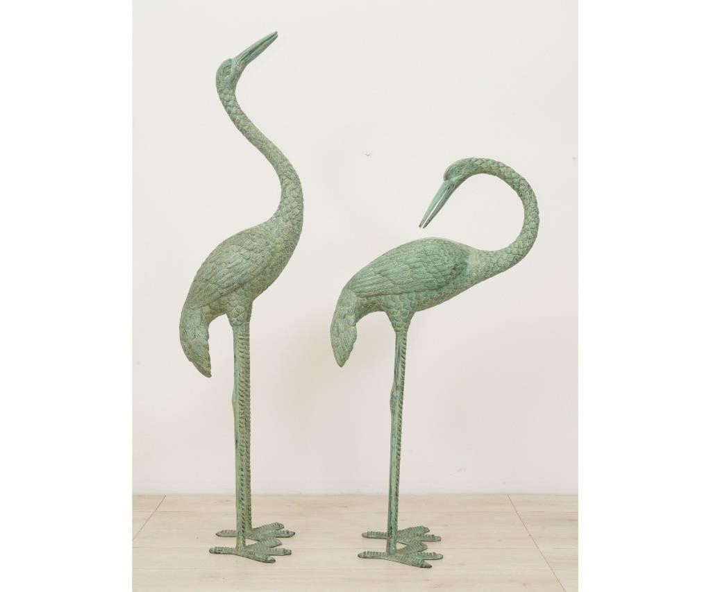 Appraisal: Pair of life size faux bronze metal standing cranes th