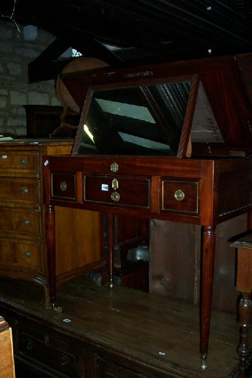 Appraisal: A mid th century mahogany dressing table the rising top