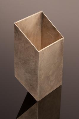 Appraisal: A silver box of geometric cut cube form Britannia standard