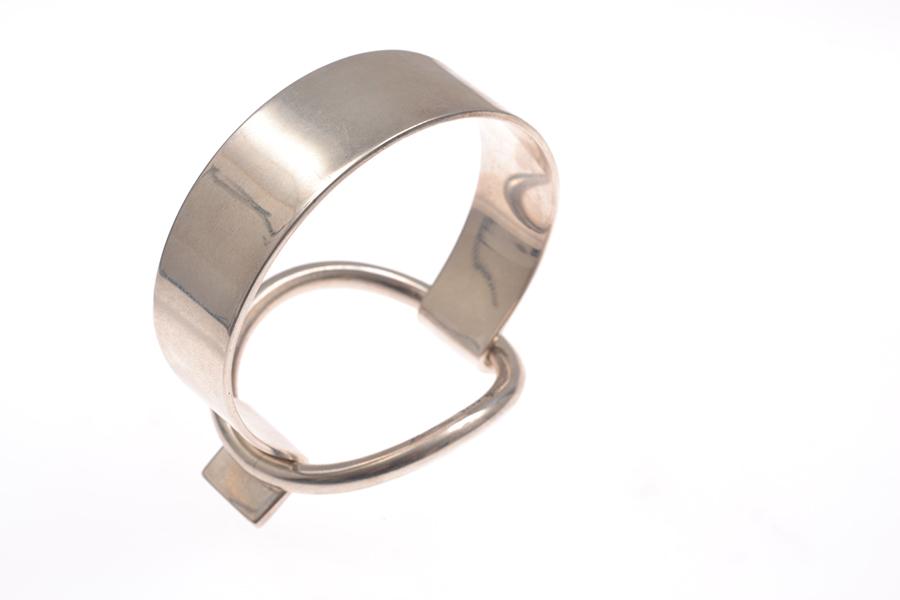 Appraisal: A BANGLE BY HANS HANSEN IN STERLING SILVER A BANGLE