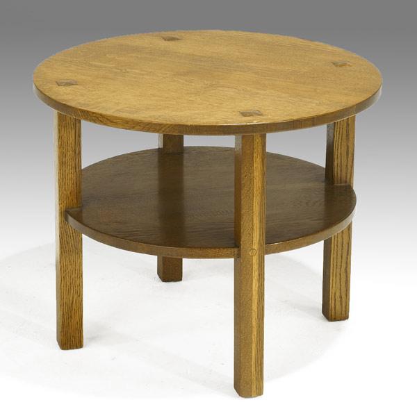 Appraisal: L J G STICKLEYRound tea table with legs extending through