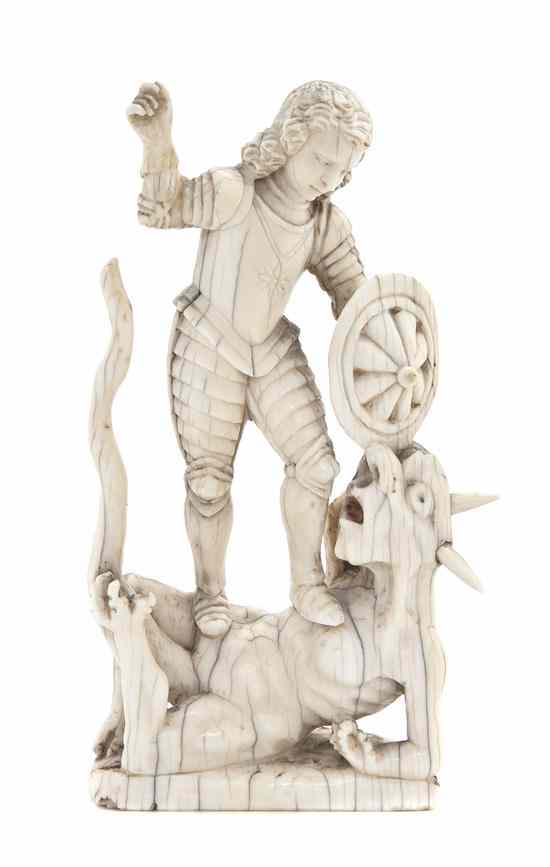 Appraisal: A Continental Carved Ivory Figural Group depicting Saint Michael ejecting