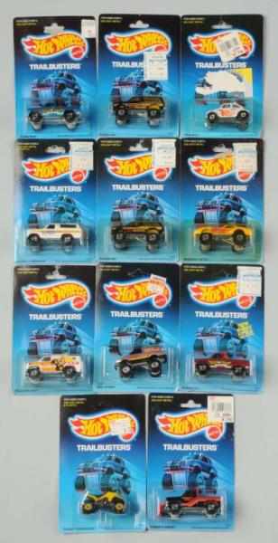 Appraisal: Lot of Mattel Hot Wheels Trailbuster Vehicles Description Includes Suzuki