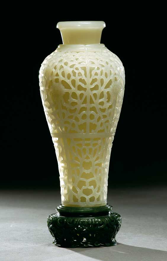 Appraisal: FINE WHITE JADE VASE Meticulously carved Chinese white jade vase