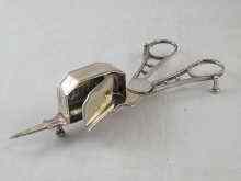 Appraisal: A pair of Georgian silver candle snuffers by W B