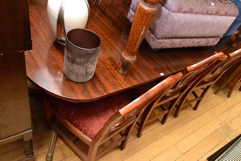 Appraisal: A REGENCY STYLE TABLE WITH ONE SPARE LEAF A REGENCY