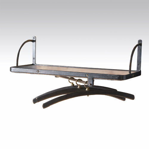 Appraisal: JACQUES ADNET Leather wall-mounted shelf and three matching clothing hangers