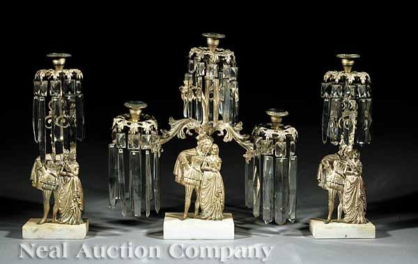 Appraisal: An American Silvered Brass and White Marble Three-Piece Girandole Garniture