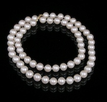 Appraisal: A Strand of mm Cultured Pearls A long strand of