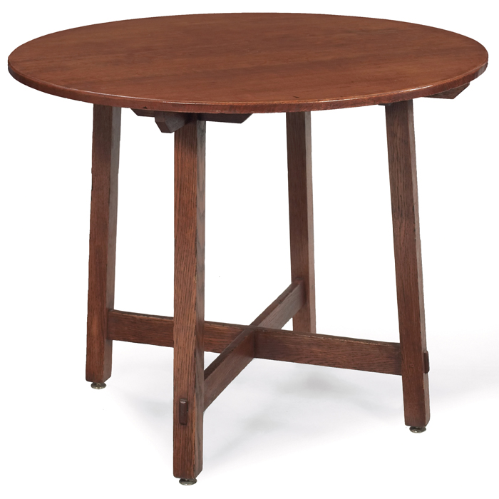 Appraisal: Limbert lamp table similar to circular top over a cross-stretcherbase