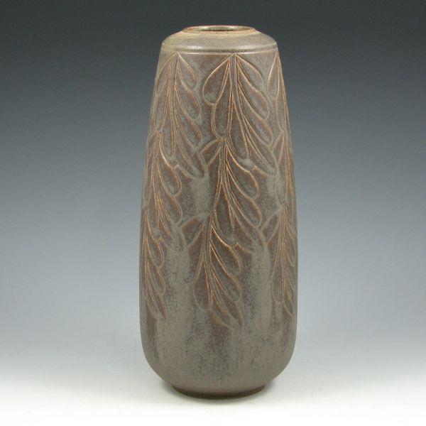 Appraisal: Chris Powell of a kind vase with cascading leaves finished