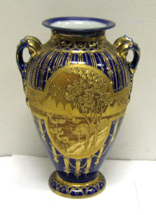 Appraisal: NIPPON COBALT BLUE PORCELAIN VASE Handled baluster body with gold