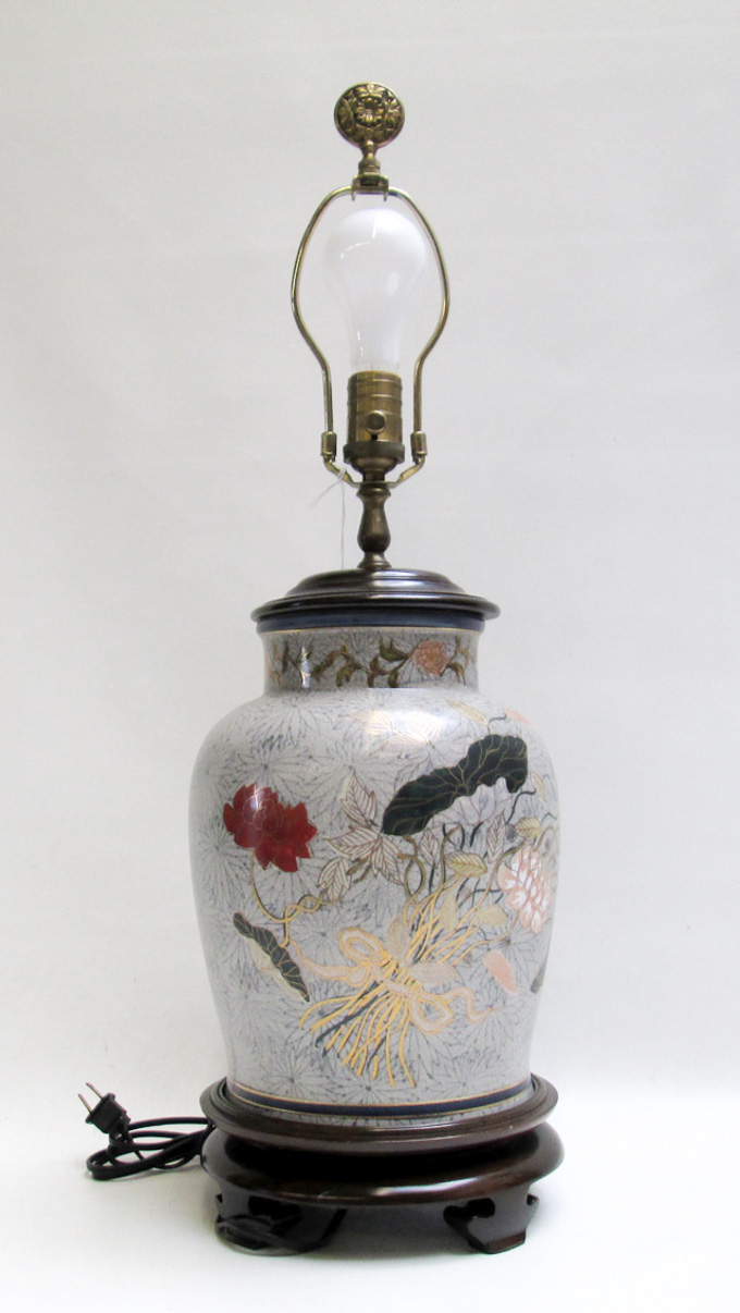 Appraisal: ASIAN EARTHENWARE TABLE LAMP having conforming wood base and lid