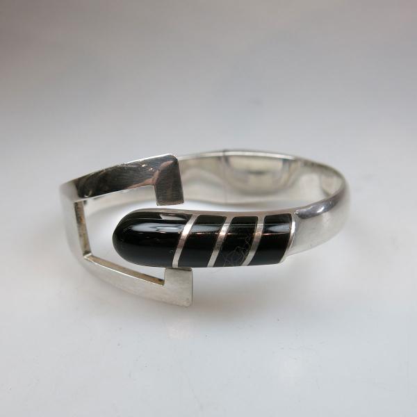 Appraisal: Mexican Grade Silver Spring Hinged Bangle set with onyx panels