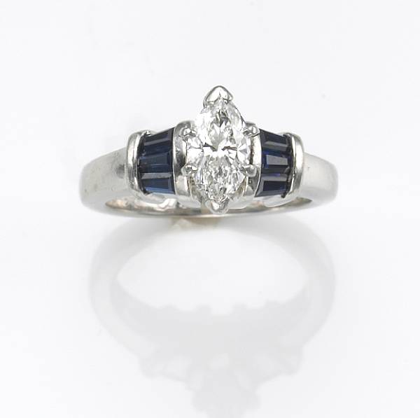 Appraisal: A diamond sapphire and platinum ring