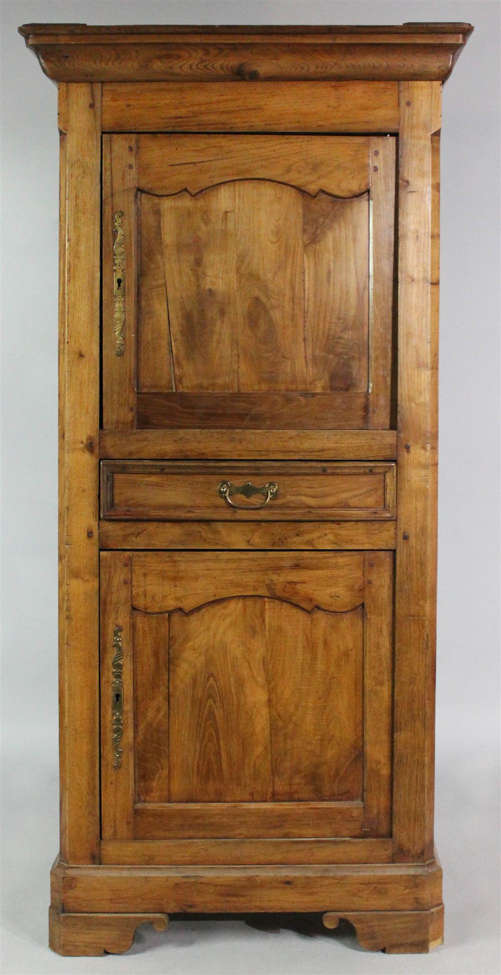 Appraisal: PROVINCIAL PEARWOOD CUPBOARD having a molded cornice over a paneled