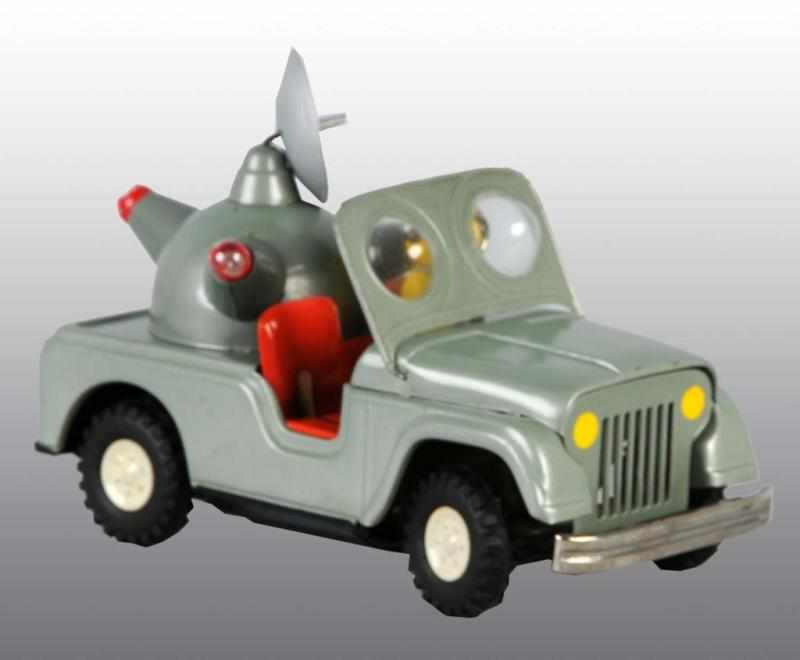 Appraisal: Tin Moon Jeep Battery-Operated Toy Description Japanese Working Plastic bubbles