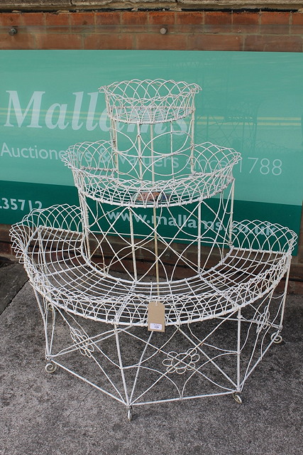 Appraisal: A VICTORIAN WHITE PAINTED WIREWORK PLANT STAND of graduated semi-circular