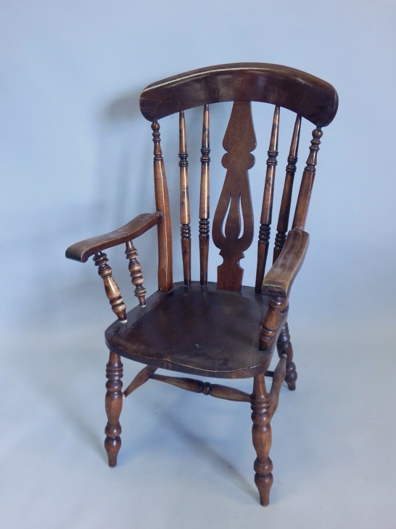 Appraisal: A late thC Windsor type chair with a pierced splat