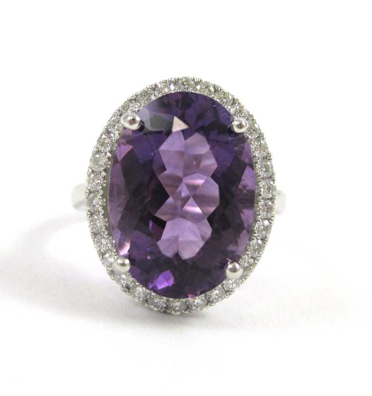 Appraisal: AMETHYST DIAMOND AND FOURTEEN KARAT GOLD RING The white gold