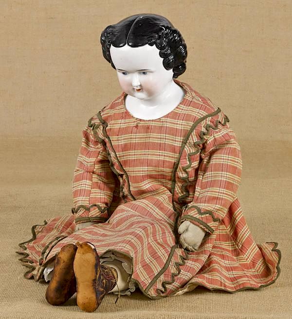 Appraisal: Large German China head and shoulder doll with mo Large