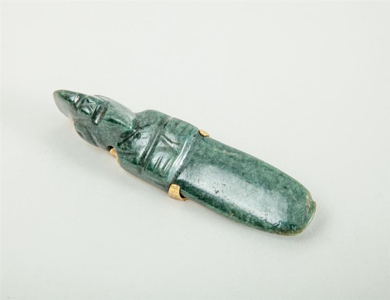 Appraisal: K GOLD-MOUNTED CARVED JADE PIN The gold marked 'F W