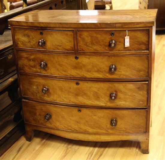 Appraisal: An early th century mahogany bowfront chest of two short