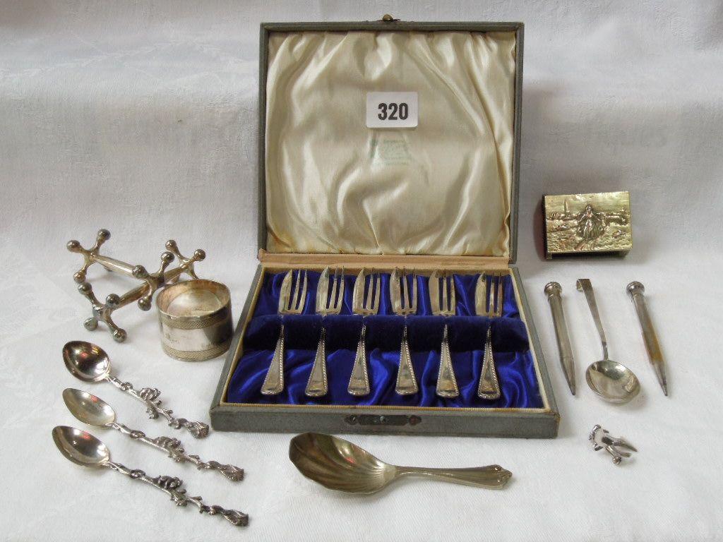 Appraisal: A boxed set of six pastry forks with feather edged