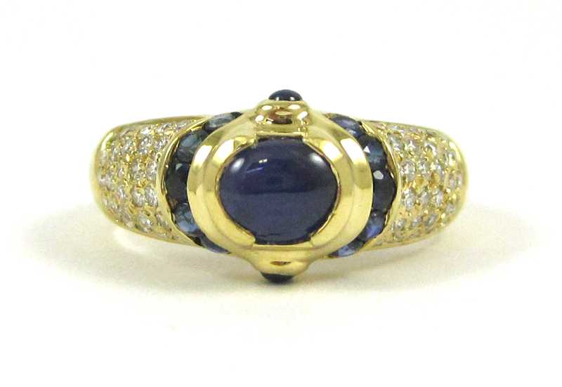 Appraisal: SAPPHIRE DIAMOND AND EIGHTEEN KARAT GOLD RING with round-cut diamonds