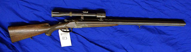 Appraisal: Drilling side by side over under combination rifle shotgun ga