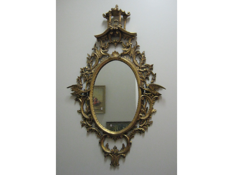 Appraisal: ELABORATE GILT FRAMED OVAL WALL MIRROR Having a large pagoda