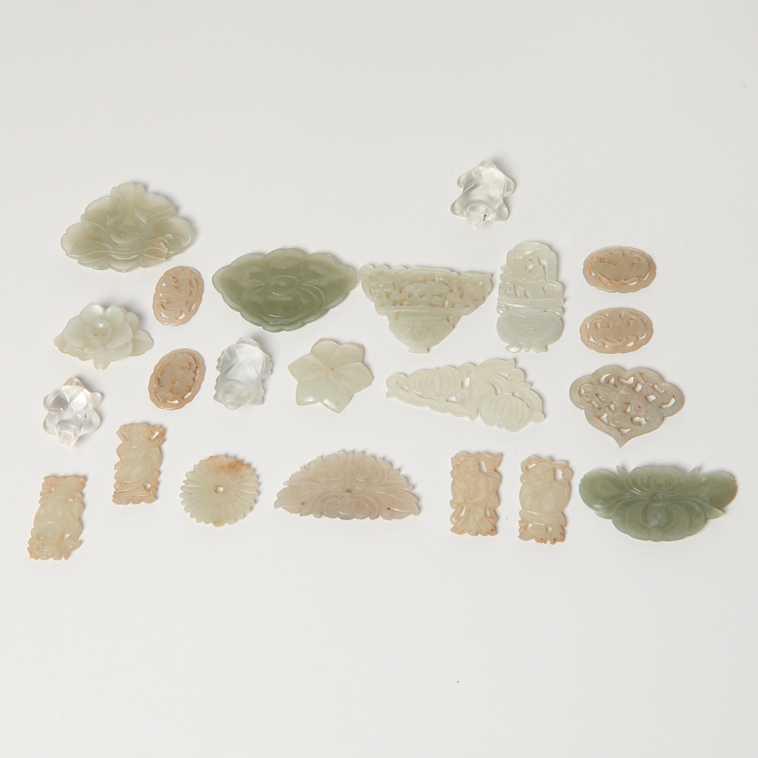 Appraisal: JADE AND HARDSTONE TOGGLES AND PLAQUES th c incl figures