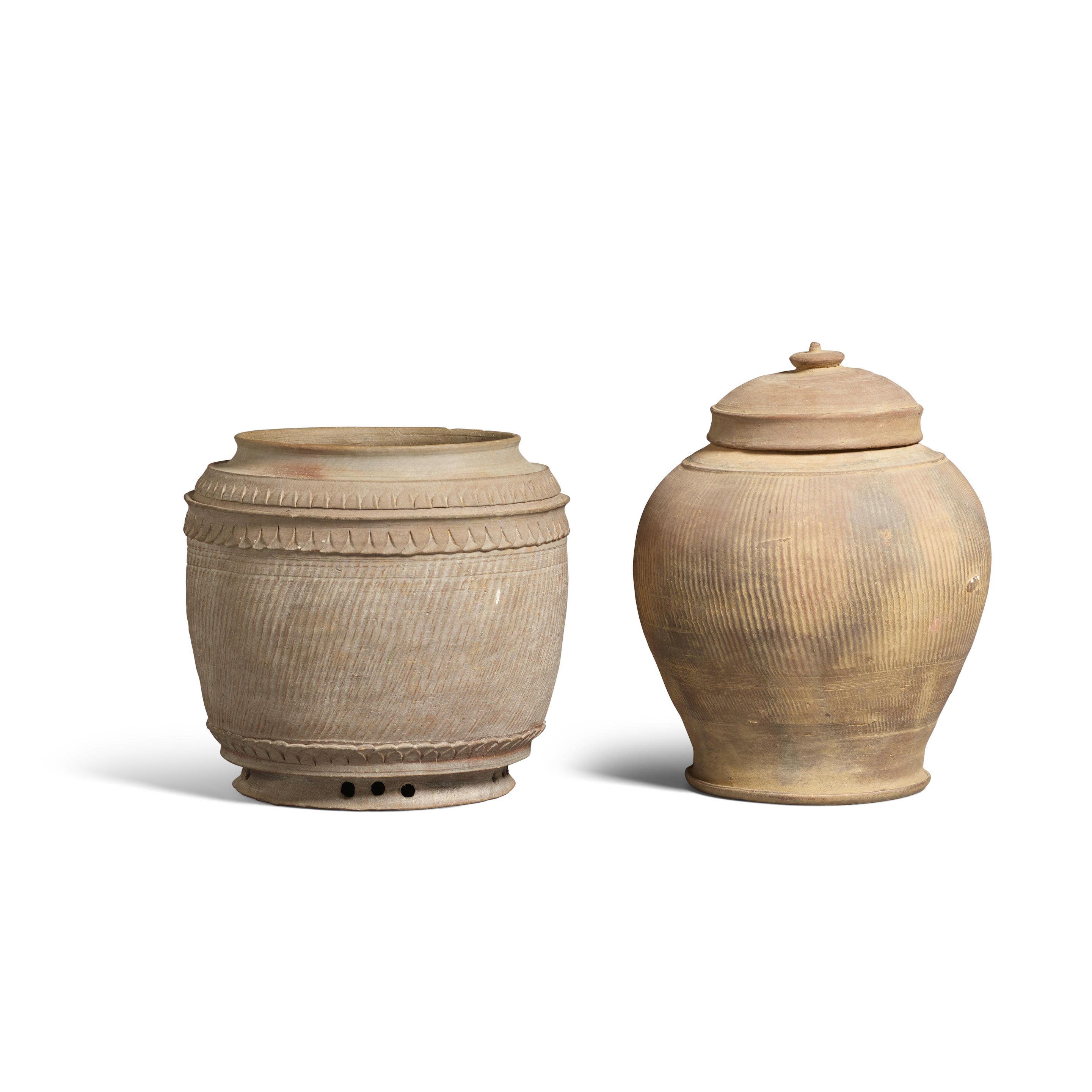 Appraisal: TWO GRAY STONEWARE JARS Vietnam Tran dynasty th century Vietnam